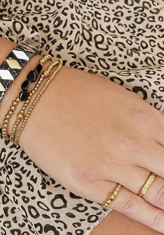 Armband black rocks goud
